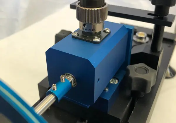 Blue Inline Torque Transducer being calibrated