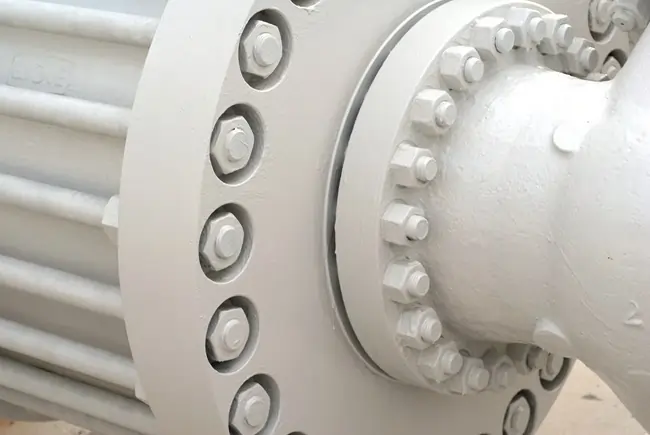 White bolts attaching metal painted white