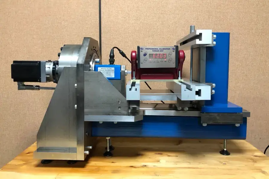 AWS Bench Top torque tester fixed to a calibration machine