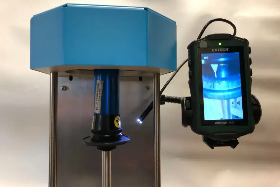 Camera fixed to a calibration machine showing the dial on a torque screwdriver