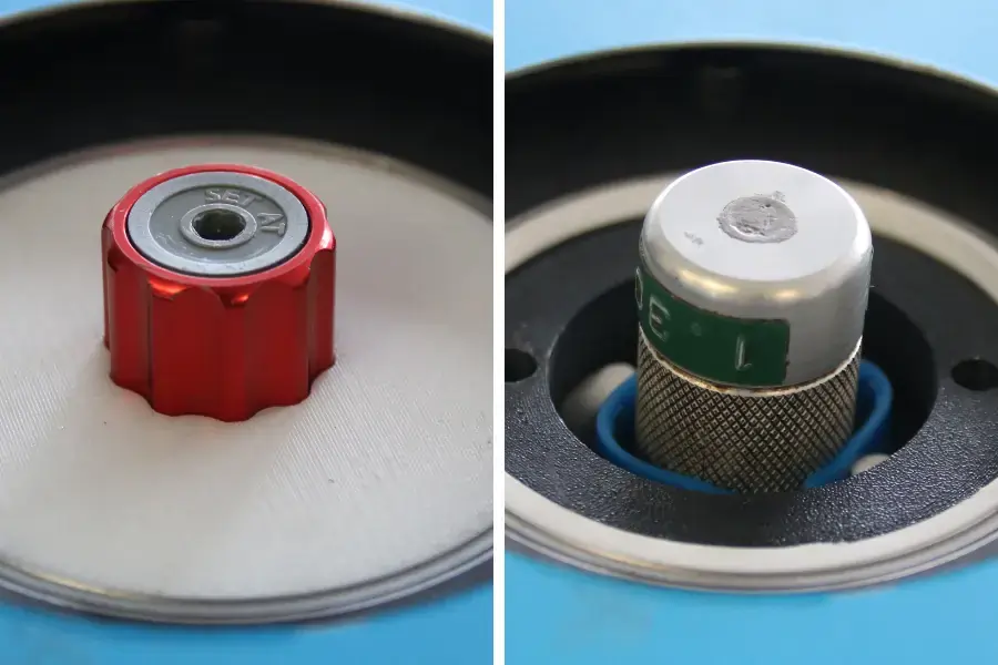 Two torque screwdrivers held in a machine using handles