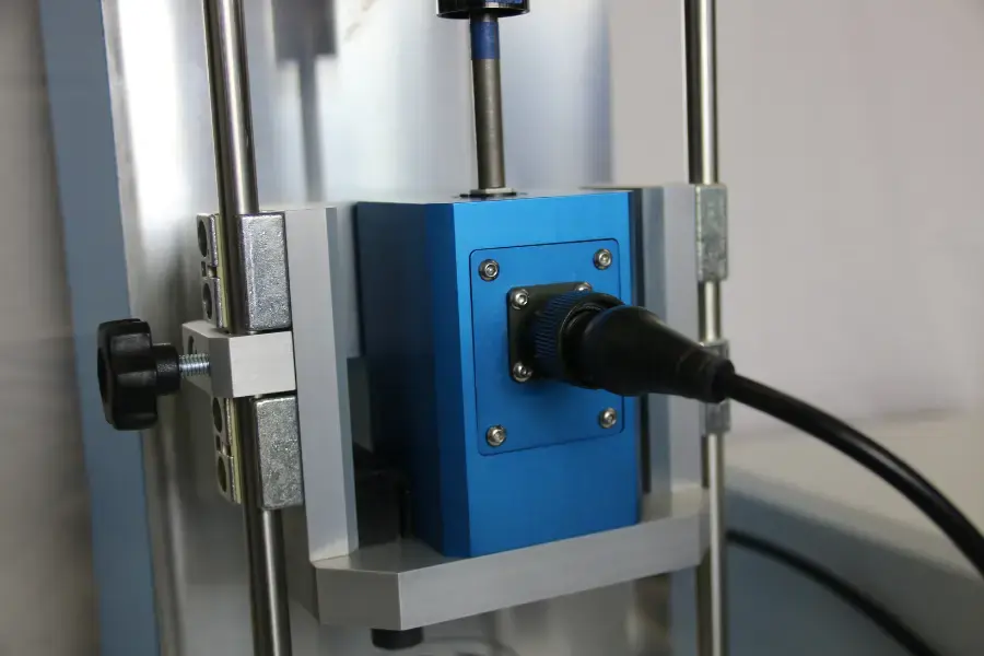 Blue Inline torque transducer in a calibration machine