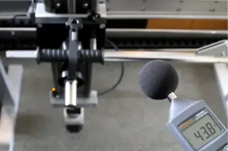 Someone checking the volume of a torque wrench calibrator in db