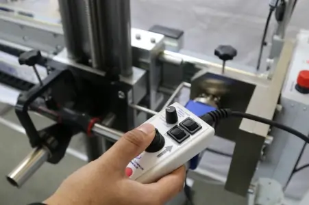 Person using a torque wrench calibrator via a Handheld Controller