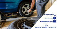 Wheel nut being tightened by torque wrench