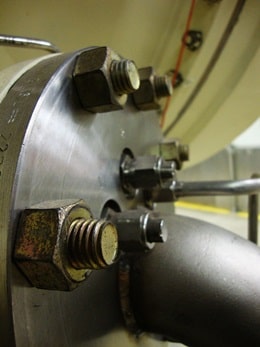 Bolts around a metal plate